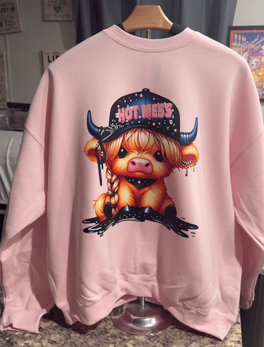 Custom Print Sweatshirts Heavyweight Comfort with cute cow graphic and 'HOT.MESS' text on pink background.