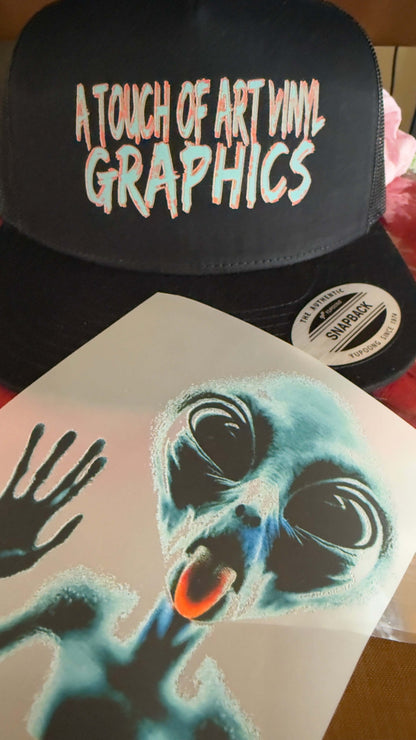 Custom Hats - Personalize Your Style with Unique Designs featuring an alien graphic design on a stylish black cap.