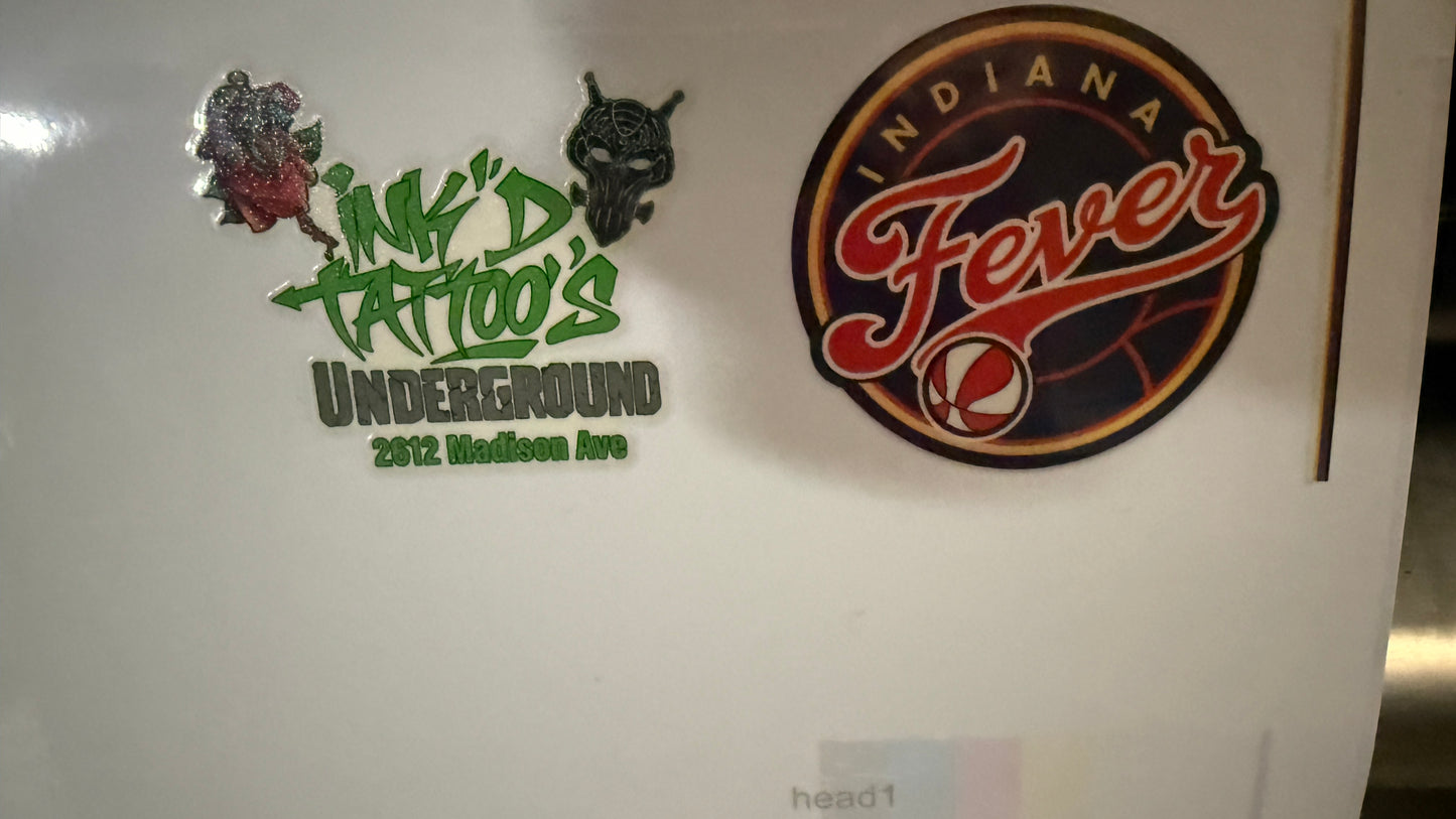 Custom gang sheets featuring Ink'd Tattoo's and Indiana Fever logos, ideal for high-volume production.